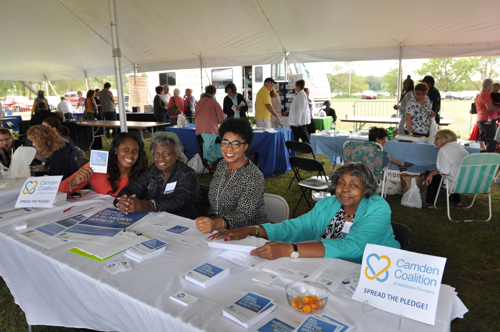 Community Advisory Committee members tabling at a community event